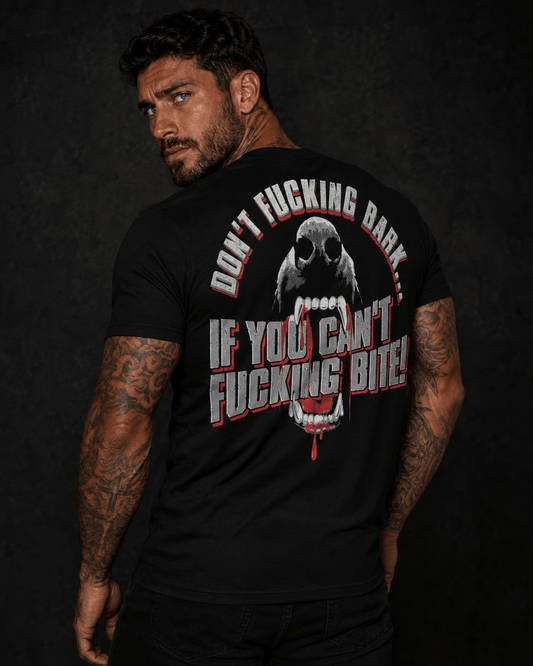 DONT BARK IF YOU CANT BITE T-SHIRT featuring a snarling beast graphic on the back, promoting a bold streetwear style.