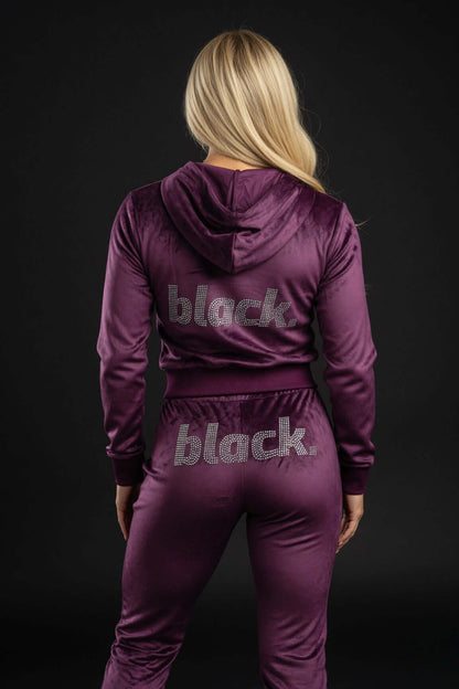 Black Velour Track Suit Jacket with rhinestone back and oversized hood on model in clearance sale