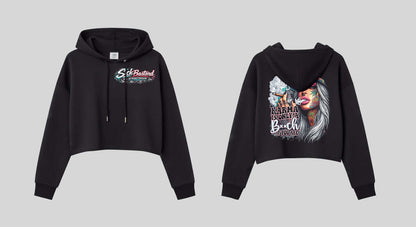Black Karma Cropped Hoodie with bold tattooed smoking beauty graphic and "Karma is only a Bitch if you are" slogan, streetwear style