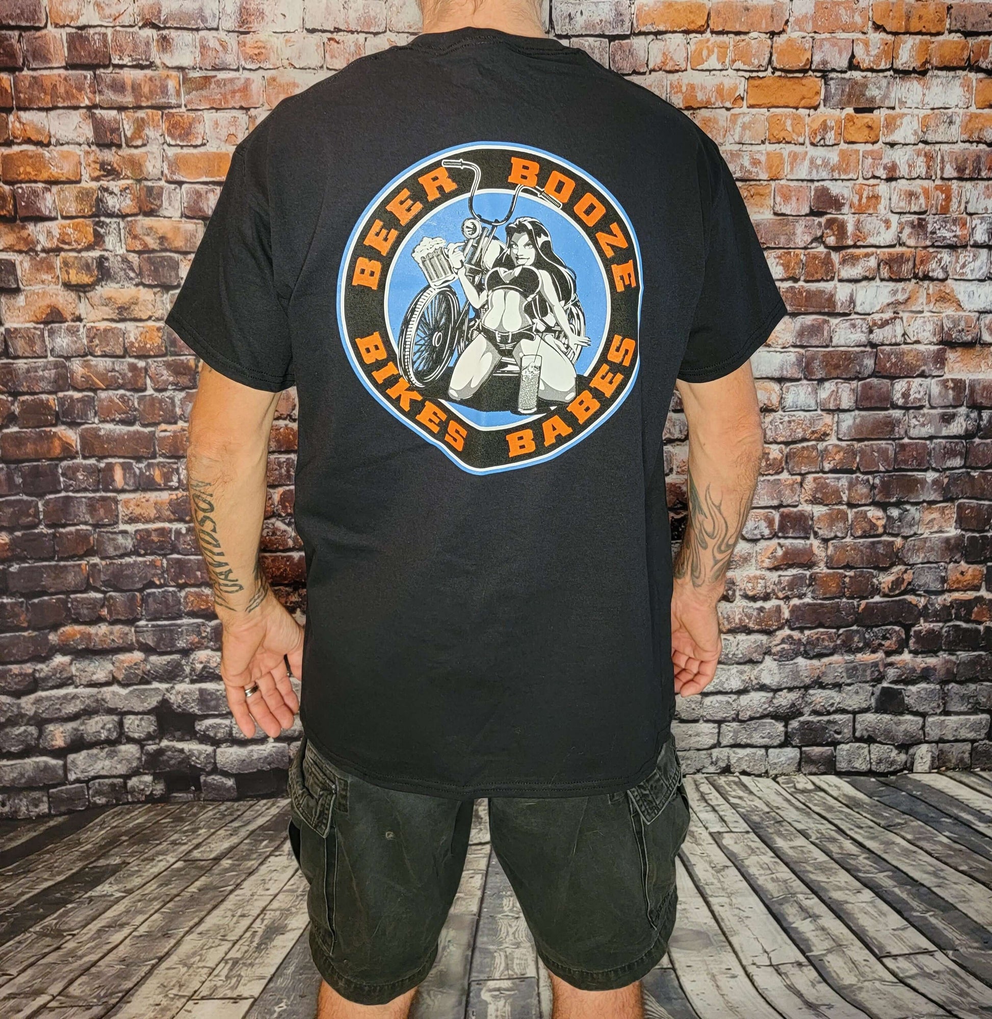 Beer Bikes Shirt featuring a striking design of a girl and Harley Davidson on the back, embodying adventure and rebellion.