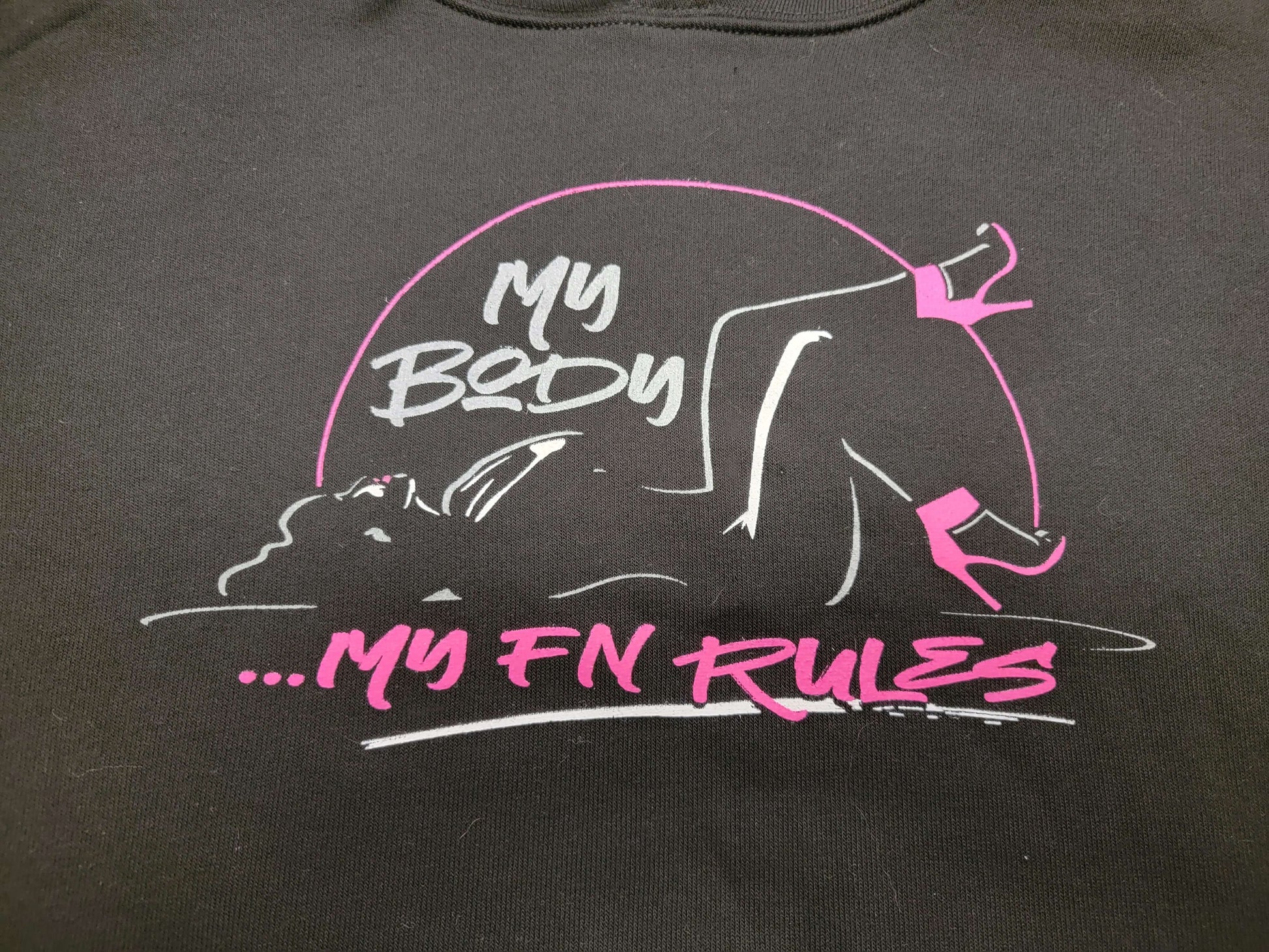 Black ladies cropped fleece hoodie featuring My Body My FN Rules graphic design, part of women's cropped fleece hoodie collection.