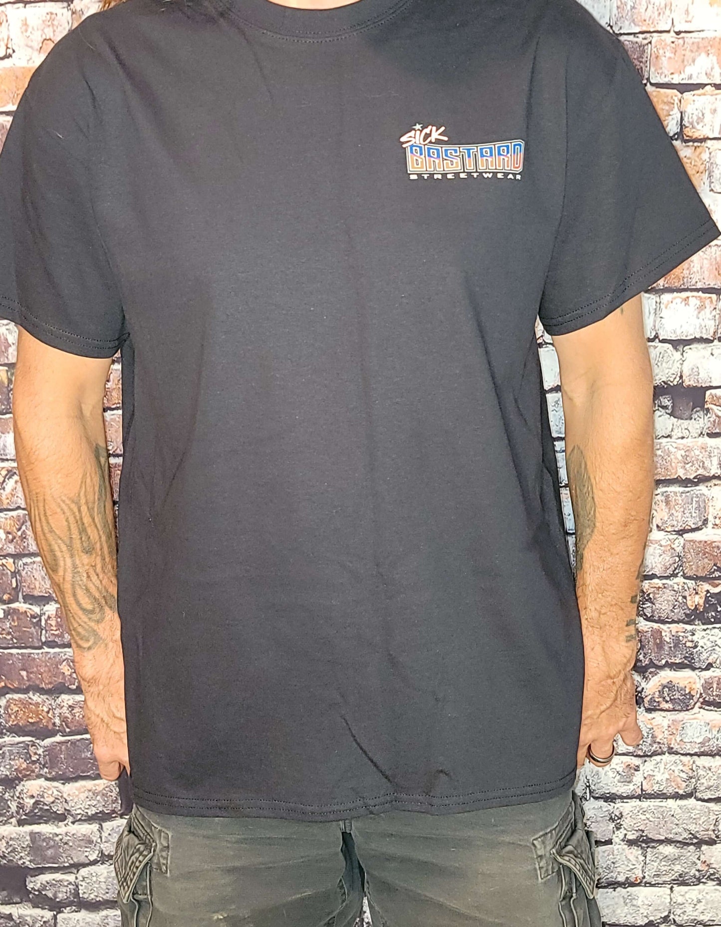 Beer Bikes Shirt featuring a black short sleeve t-shirt worn by a model with tattoos, showcasing edgy streetwear style.
