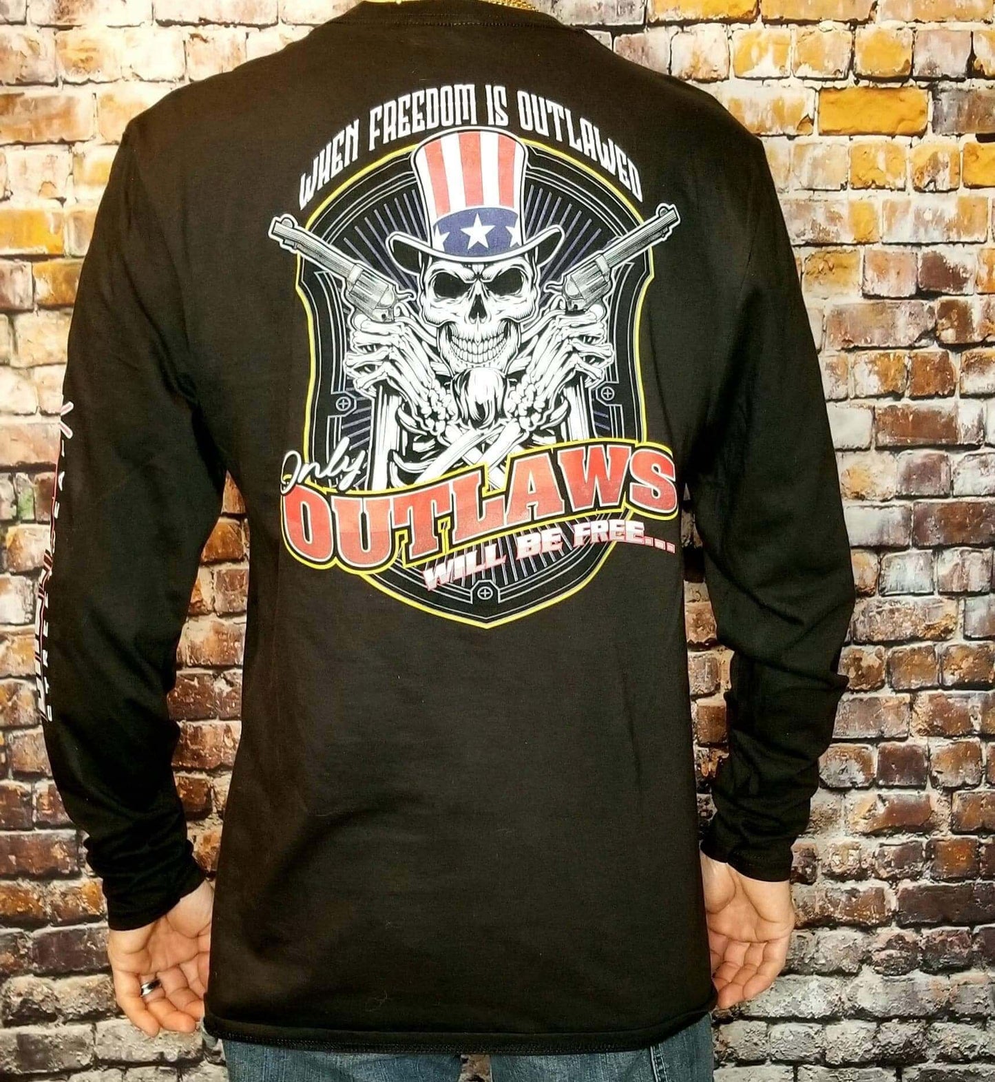 Freedom long sleeve shirt featuring a skull design and the phrase 'When Freedom is Outlawed only Outlaws will be Free'.